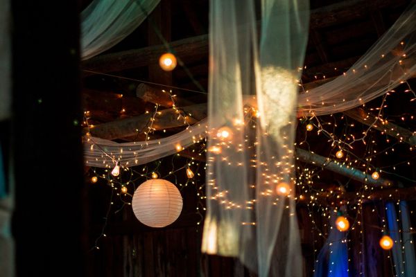 Lighting at night at an outdoor wedding