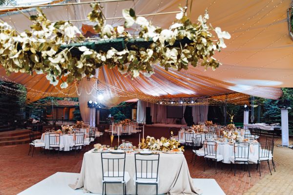 Wedding tables under a big tent